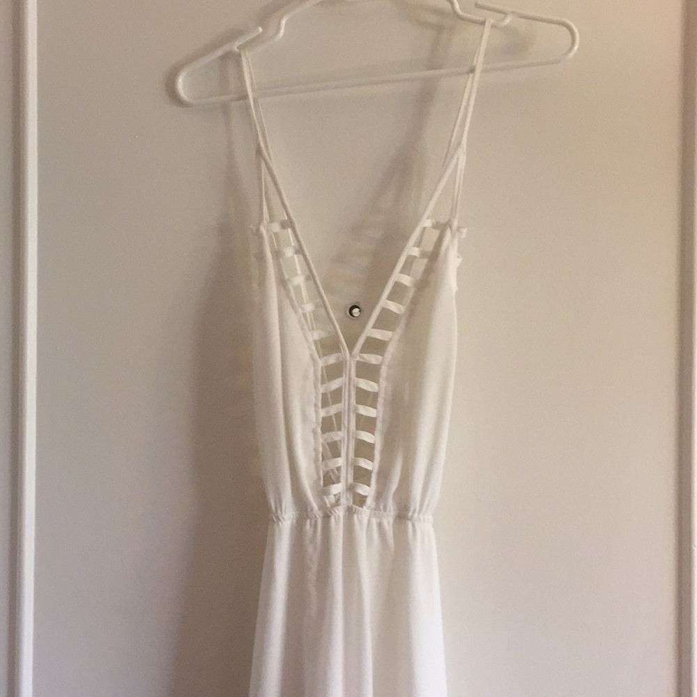 White knee-length dress